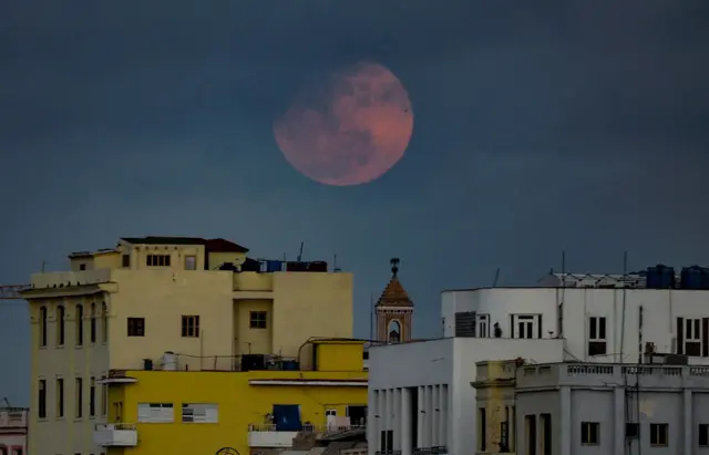 The pink supermoon seen above Havana in Cuba