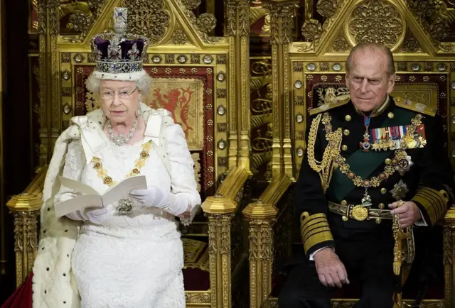 Queen Elizabeth II sits beside the Duke of Edinburgh during the State Opening of Parliament, December 3rd 2008