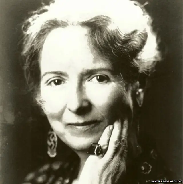 Savitri Devi in swastika earrings