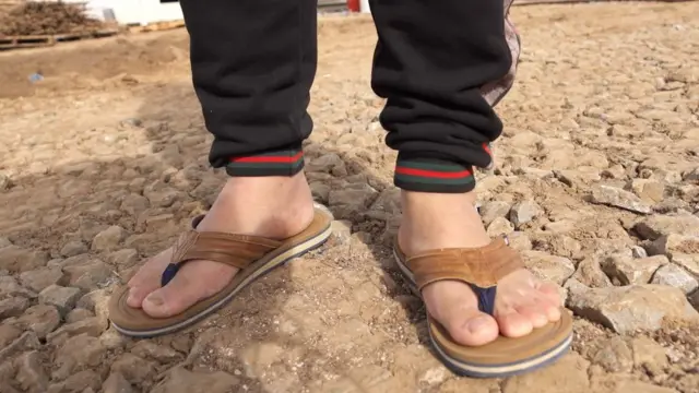 Aaron in his leather slippers