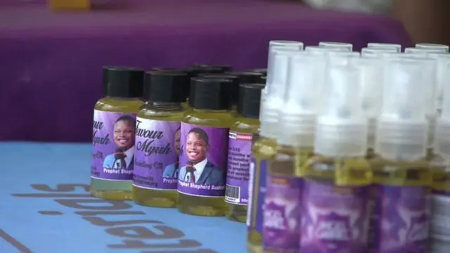 Bottles of oil wit Bushuri face ontop