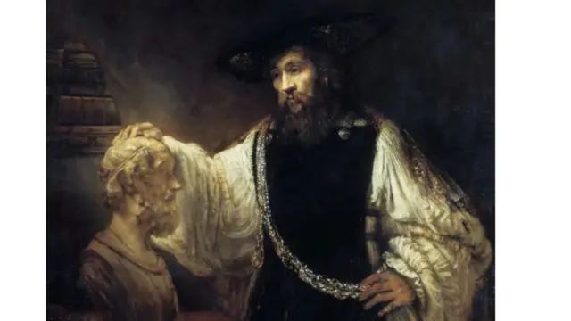 Aristote perdu dans ses pensées, la main sur un buste d'Homère - peut-être même en train de contempler une petite métaphysique.