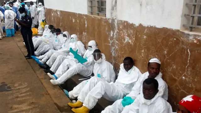 The burial team members wey handle the dead-bodis dem plenty well-well