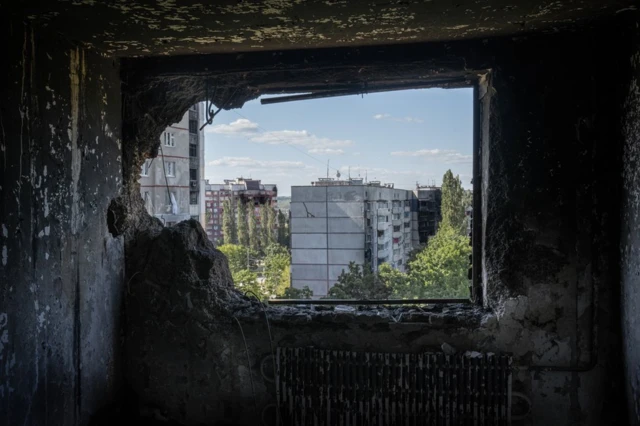 The view from a destroyed Saltivka apartment. Many have been turned to little more than ash