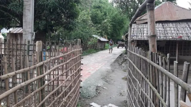 Soni's house with a fence around it to keep people away while they were isolating
