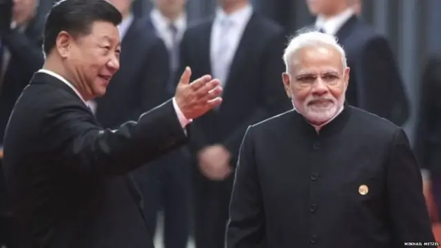 शी जिनपिंग आणि नरेंद्र मोदी