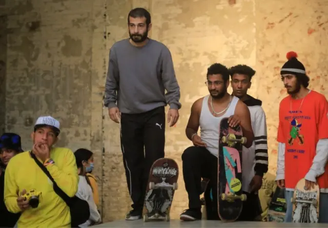 Egyptian skateboarders look on at the start of the competition.