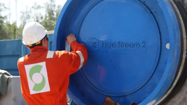 A worker at a construction site for Nord Stream 2