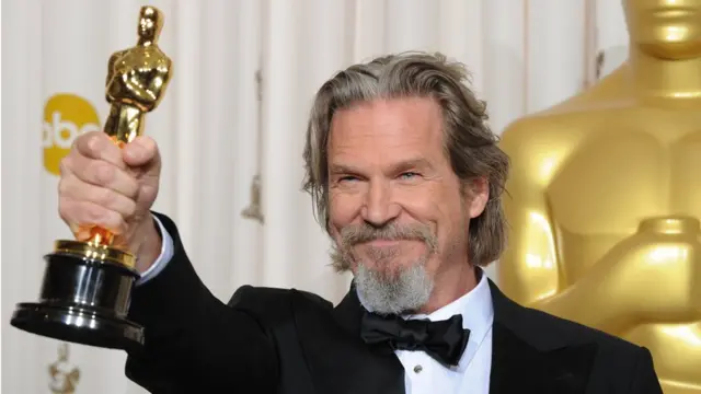 Jeff Bridges with the Oscar he received for Crazy Heart in 2010