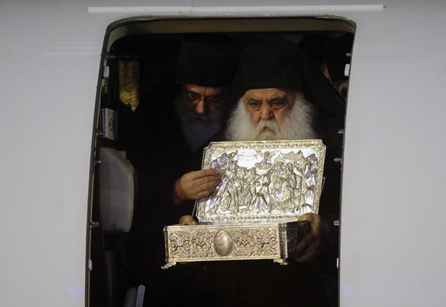 monk from St. Paul's monastery appears upon arrival at Vnukovo-3 Airport. He has brought a shrine containing sacred relics from Mount Athos in Greece, believed to be the gifts presented by the Magi, or Three Wise Men to the Baby Jesus. The sacred relics are to be displayed in Moscow's Cathedral of Christ the Saviour and later in St Petersburg and Ukrainian capital Kiev.