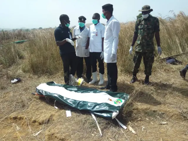The body of late General Alkali in a body bag