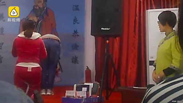 Screenshot of a Pear Video piece on Chinese virtue schools