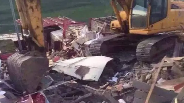 Digger at Larung Gar