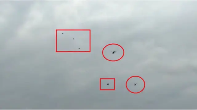 ప్రధానమంత్రి ప్రయాణిస్తున్న హెలీకాప్టర్ సమీపంలో నల్ల బెలూన్లు