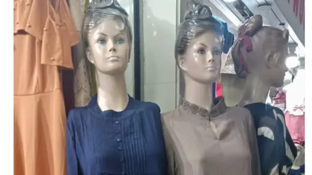 দোকানে সাজানো ঈদের পোশাক