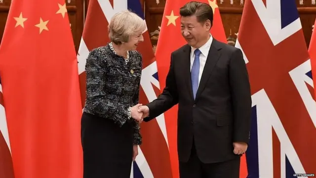 Theresa May meeting Chinese President Xi Jinping in 2016