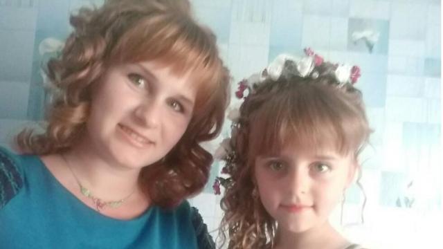 Yuliia e umabilhetes prontos bet365suas filhasbilhetes prontos bet365foto tirada antes da guerra