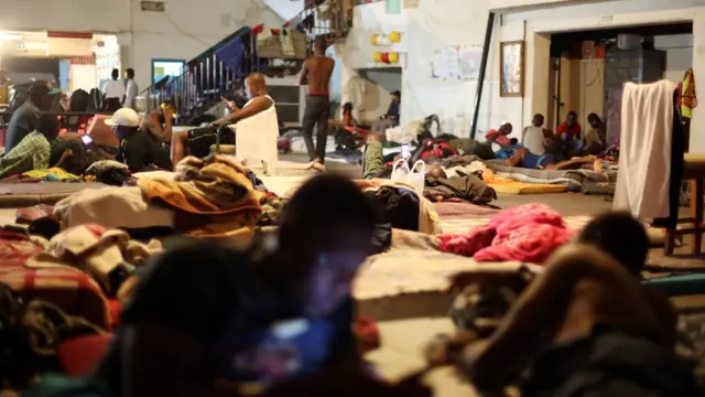 Haitianos em abrigo no México