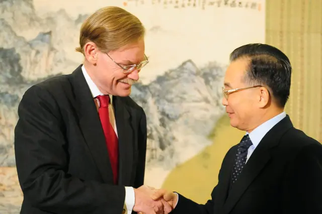 罗伯特·佐利克（Robert Zoellick）和温家宝。