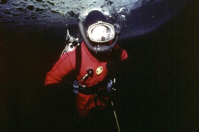 Charles diving under the arctic ice at Resolute Bay, Canada