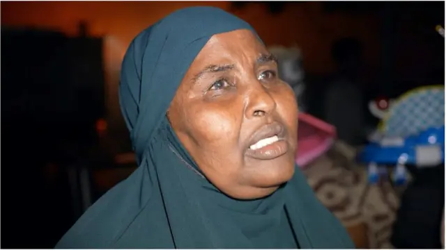 Mid ka mid dadka ay dukaamada ka gubteen