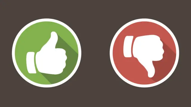 pulgares hacia arriba y hacia abajo