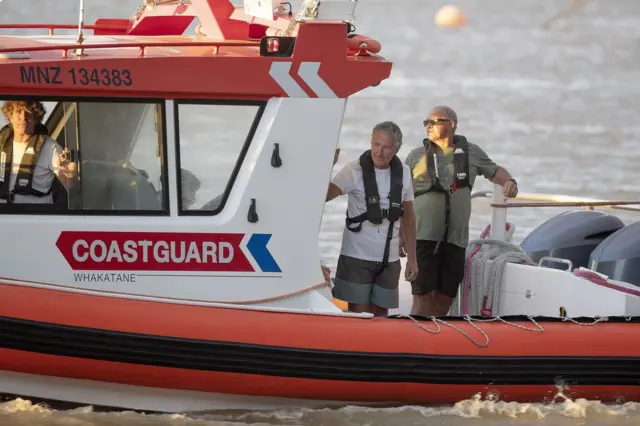 Coastguard rescue boats are pictured alongside the marina near Whakatane