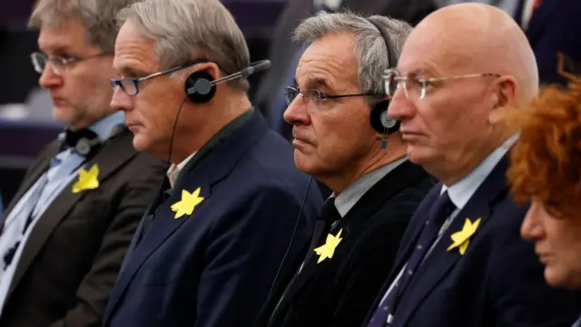 лидеры с желтой звездой Давида на лацкане, которую в гетто предписывалось носить всем его обитателям