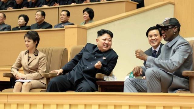 Kim Jong-un and his wife pictured with US basketball player Dennis Rodman in a Pyongyang Gymnasium in 2014