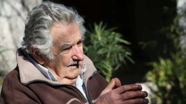 Former Uruguayan President Jose Mujica speaks with Barcelona"s Deputy Mayor, Argentinian Gerardo Pisarello (not pictured), in Montevideo, Uruguay, 06 August 2018