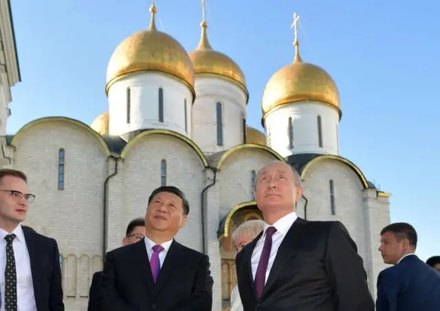 Xi Jinping dan Vladimir Putin di Kremlin