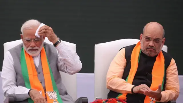 નરેન્દ્ર મોદી અને અમિત શાહ