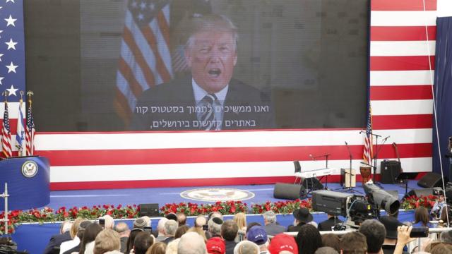 US President Donald J. Trump delivers remarks to the guests via a video connection during the opening ceremony at the US consulate that will act as the new US embassy in the Jewish neighborhood of Arnona, in Jerusalem, Israel