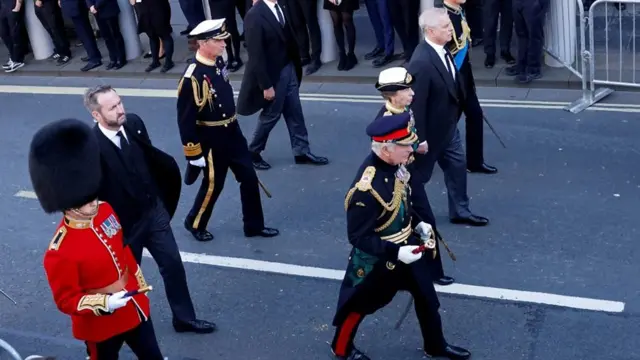 The Queen's children lead a procession behind her coffin