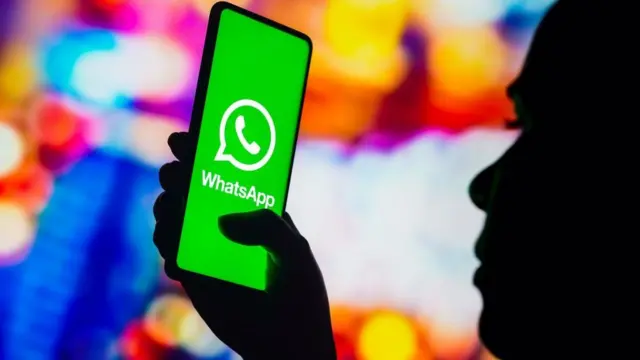 A phone with the whatsapp logo