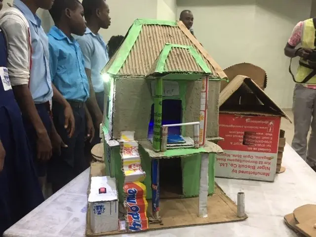 Pupils of State School 1 Sandfield Borokiri present cardboard Electricity house