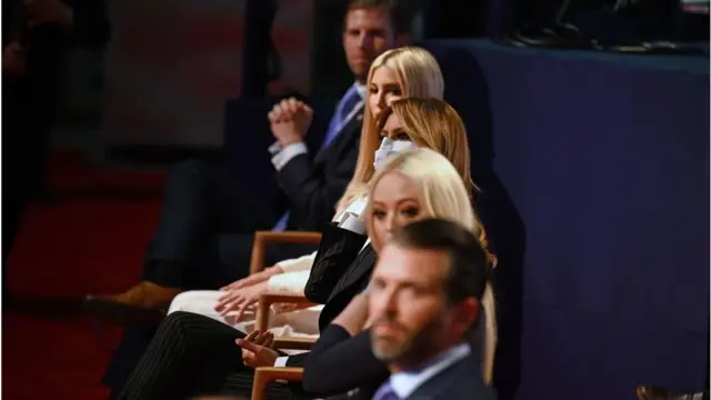 The Trump children removed their masks as they viewed the debate