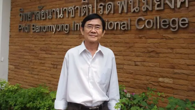 ศ.ดร.ธเนศ อาภรณ์สุวรรณ นักประวัติศาสตร์การเมืองสหรัฐฯ จากวิทยาลัยนานาชาติปรีดี พนมยงค์ แห่งมหาวิทยาลัยธรรมศาสตร์