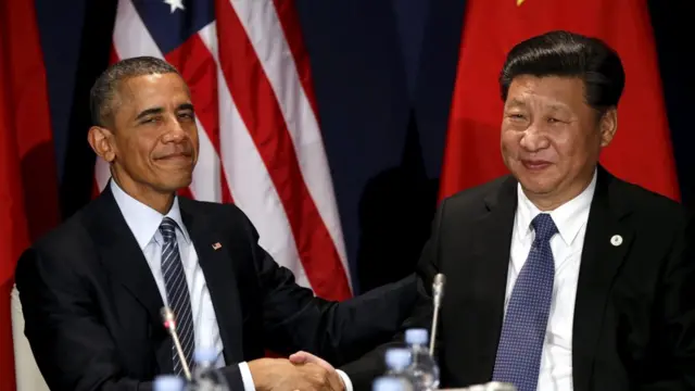 Barack Obama, berfoto dengan Presiden Cina Xi Jinping pada pertemuan tingkat tinggi Paris, menandatangani kesepakatan tersebut pada 2015.