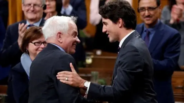 கனடா தூதர் ஜான் மெக்கலனை பதவியிலிருந்து நீக்கி உள்ளார் கனடா அதிபர் ஜஸ்டின் ட்ரூடோ