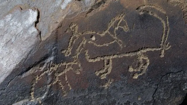 Алайдагы петроглифтер