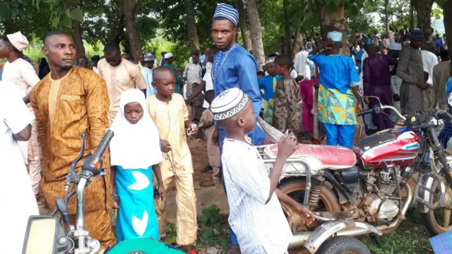 Young men posing for the camera