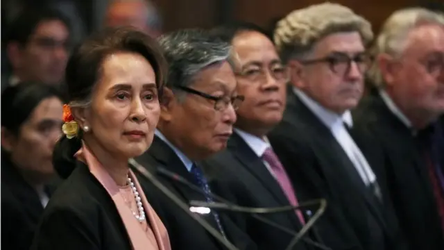 Myanmar"s leader Aung San Suu Kyi attends a hearing in a case filed by Gambia against Myanmar alleging genocide against the minority Muslim Rohingya population, at the International Court of Justice (ICJ) in The Hague, Netherlands December 10, 2019.