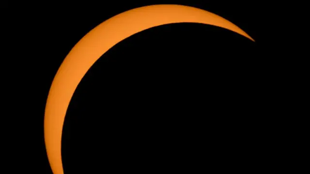Ross Lake, Washington: Amerikan Uzay ve Havacılık Dairesi'nin (NASA) paylaştığı bu fotoğrafta Ay, Güneş'in önünden geçiyor.