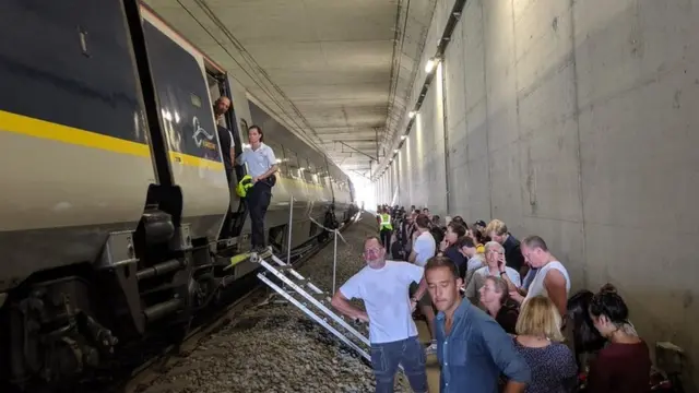 Passengers leave the Eurostar