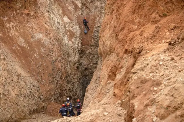 Moroccan emergency teams work to rescue five-year-old boy Rayan from a well shaft he fell into on February 1, in the remote village of Ighrane in the rural northern province of Chefchaouen on February 4, 2022.