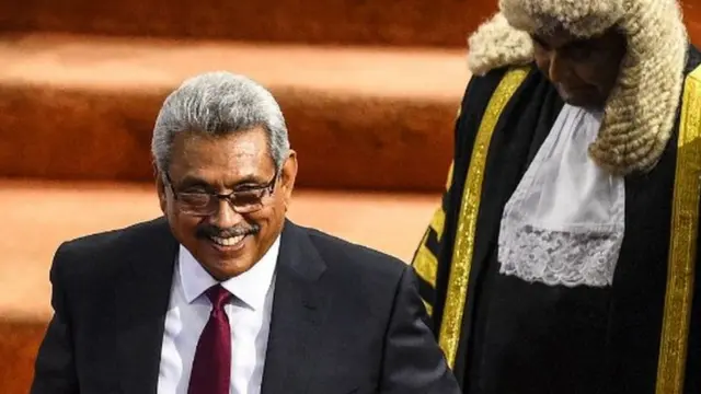 ri Lanka's President Gotabaya Rajapaksa (L) and Speaker of Parliament Mahinda Yapa Abeywardena (R) leaves after speaking at the national Parliament session in Colombo on August 20, 2020. - Sri Lanka's new parliament opened its first session on August 20 with a murderer and an accused killer among its ranks after a sweeping election victory by the ruling Rajapaksa brothers. (Photo by ISHARA S. KODIKARA / AFP) (Photo by ISHARA S. KODIKARA/AFP via Getty Images)