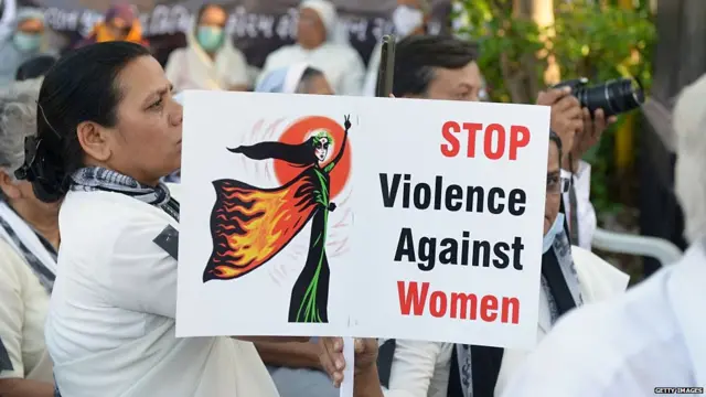 Christians attend a peace protest in Ahmedabad on March 20, 2015, in the wake of the gang-rape on an elderly nun.