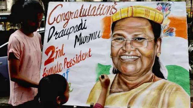 Gurukul Art School students celebrate by painting portrait pictures of Draupadi Murmu, who became 15th President Of India, Mumbai, India, 21 July, 2022.
