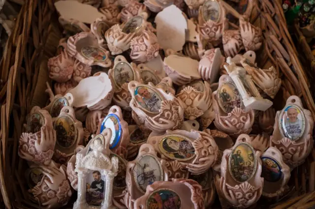 A basket of holy water fonts